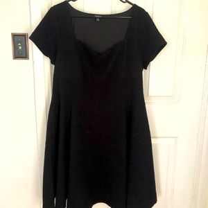 Black baby doll, square neck dress.